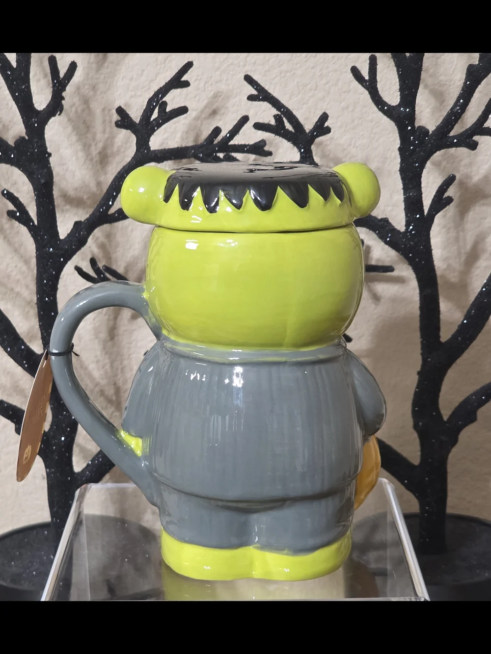 Frankenstein Bear Halloween Mug with Lid Holding A Jack-o-lantern